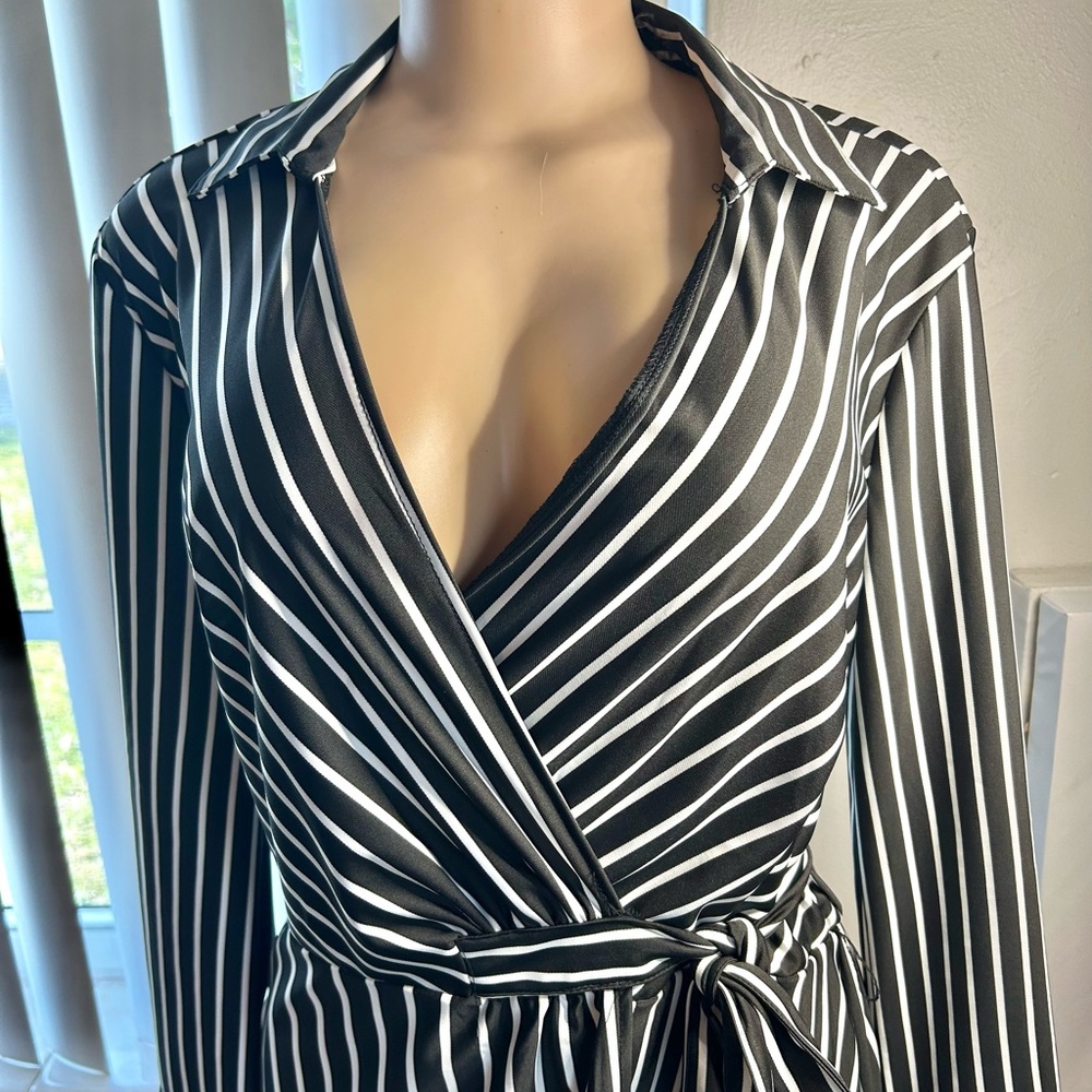 Black/ White Mlle Gabrielle striped wrap dress. Tie up dress with open front